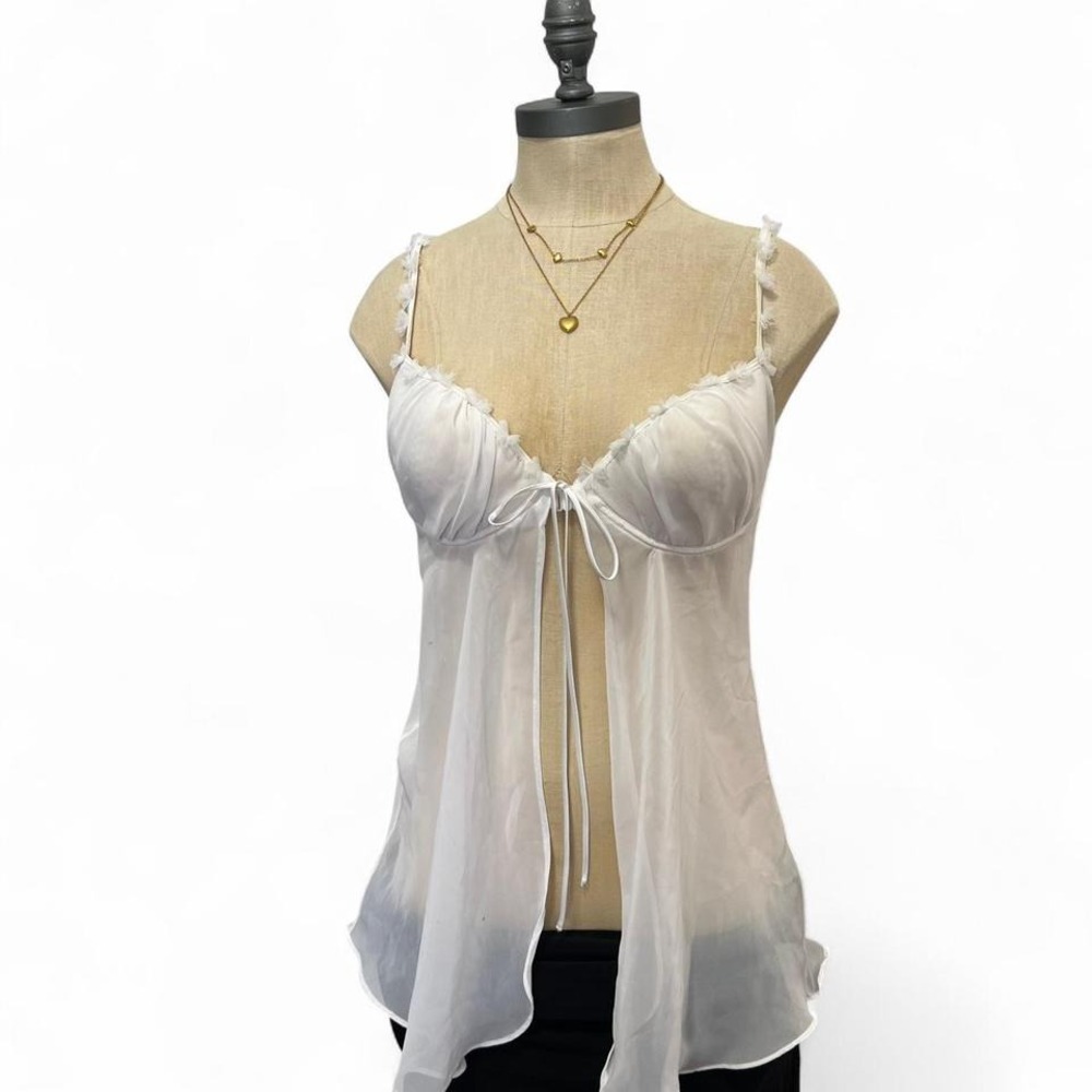 White silk babydoll top with clasp tie front and lace trim